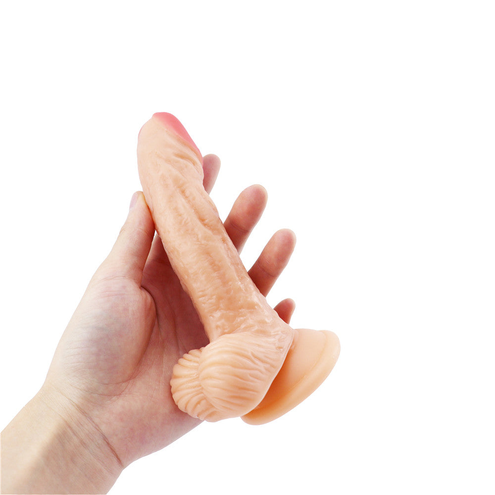 Flesh-colored curved dildo